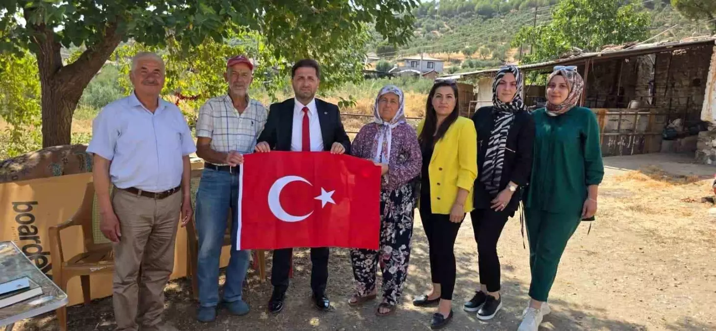ak-parti-tire-ilce-baskani-sehit-ailesini-ziyaret-etti-t9vn6Tez.jpg